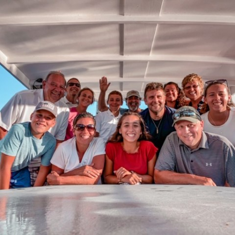 a group of people posing for the camera